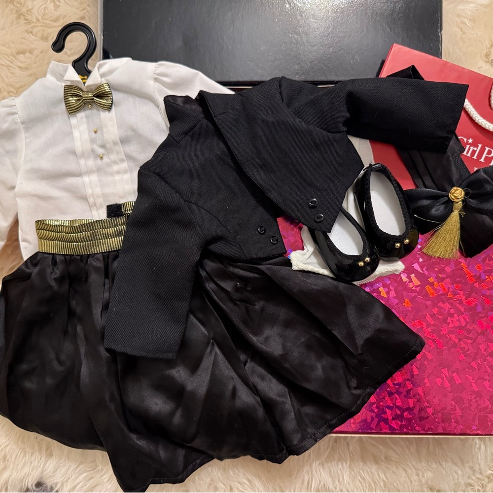 Elegant Black and White Baby Outfit with Gold Accents